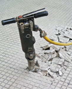Ceramic tile uplift with pneumatic drill