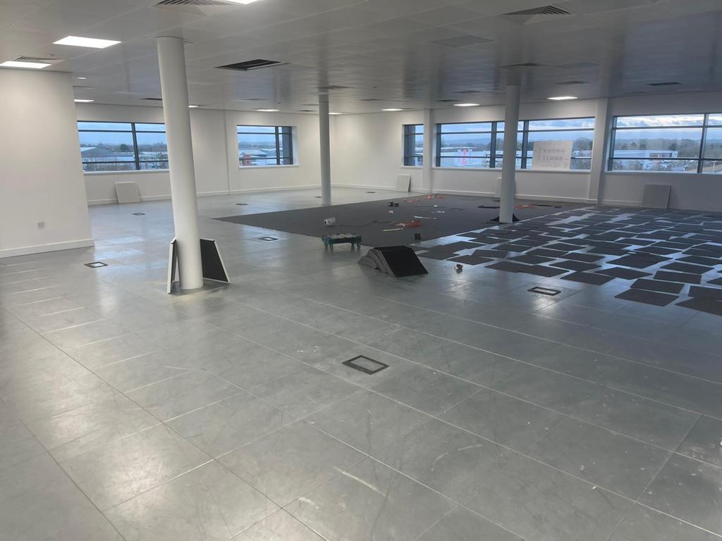 IOBAC MagTabs Adhesive-free flooring installation on metal raised access flooring