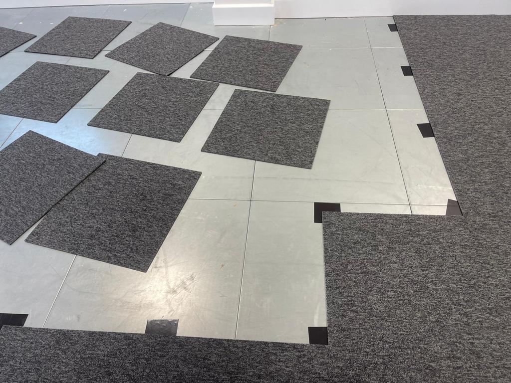 IOBAC MagTabs Adhesive-free flooring installation on metal raised access flooring