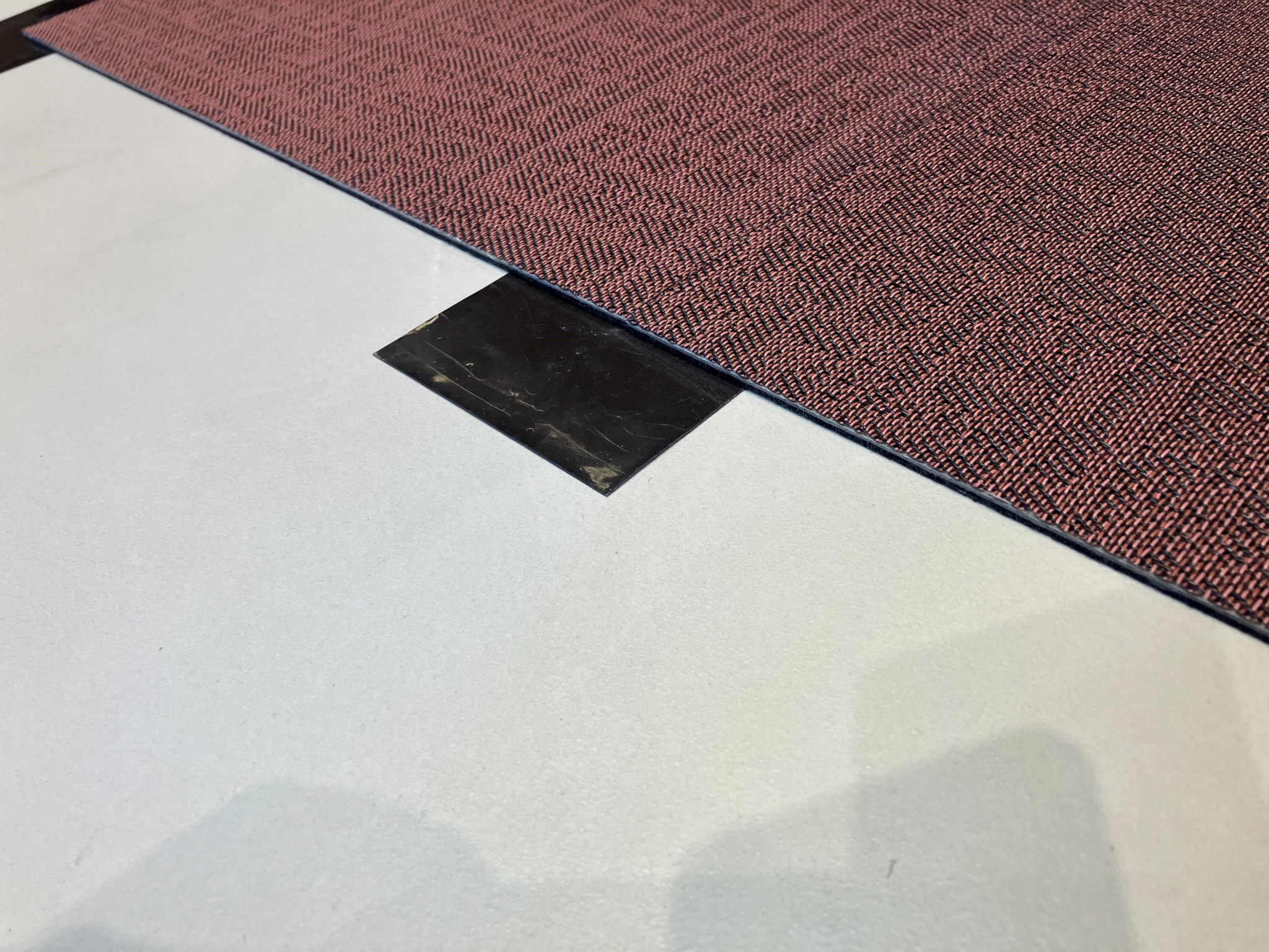 ntgrate woven vinyl flooring with IOBAC adhesive-free MagTabs